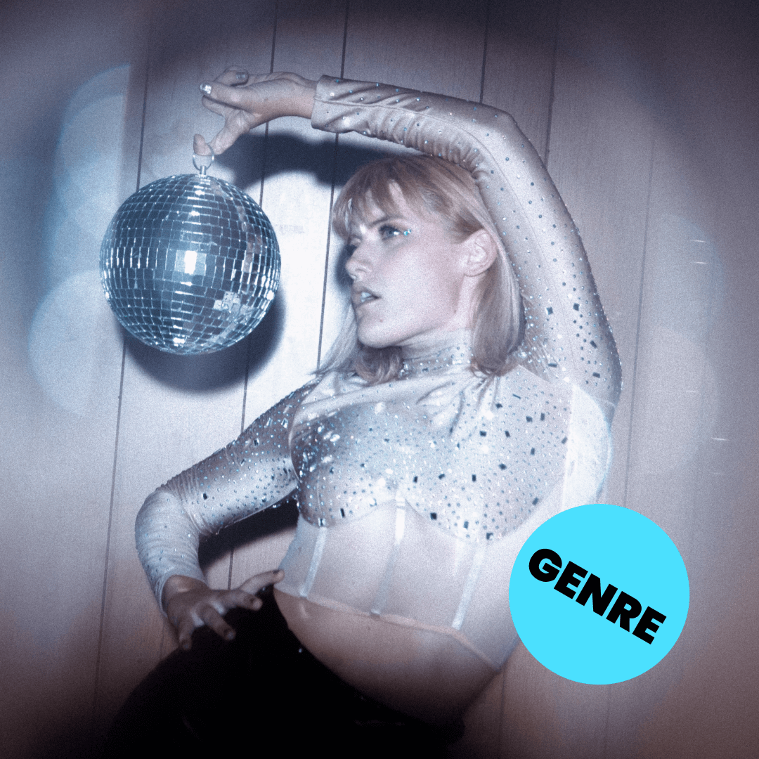 Woman posing with disco ball